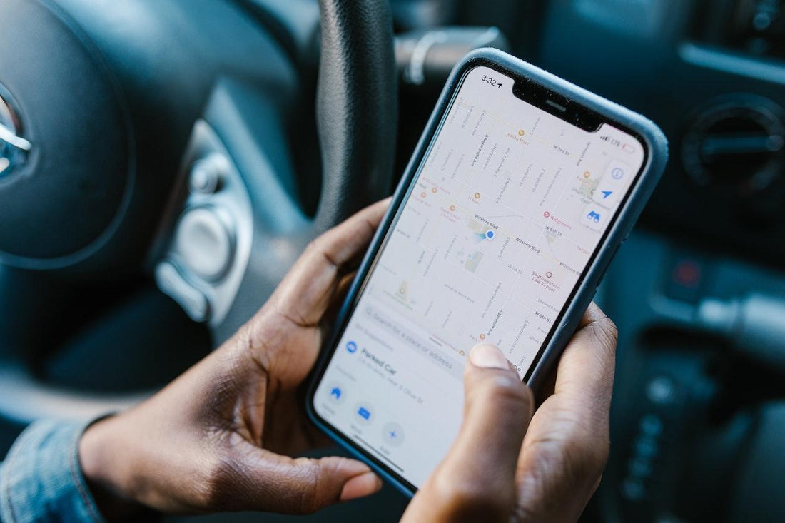 Man using GPS on phone