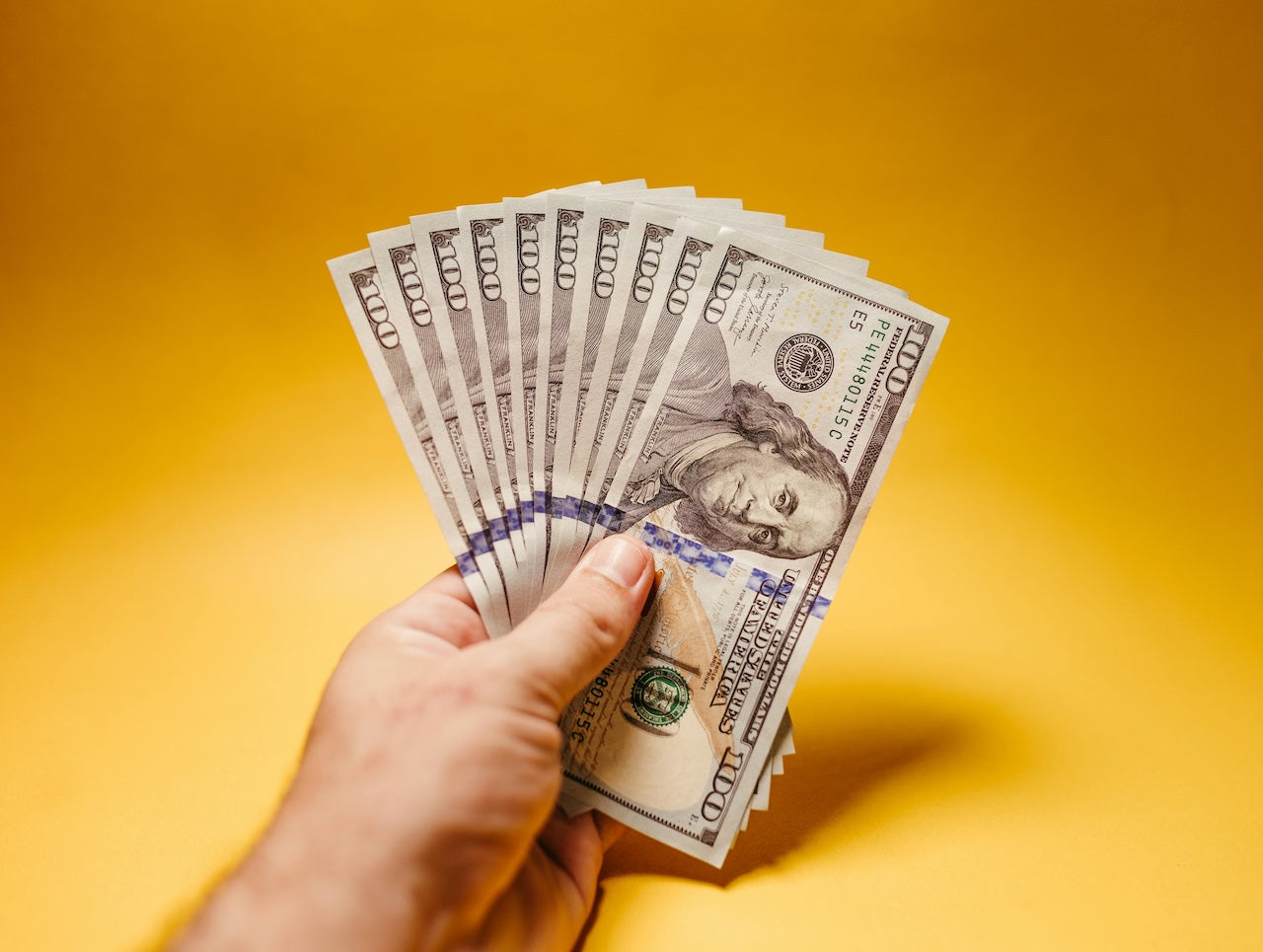 hand holding money