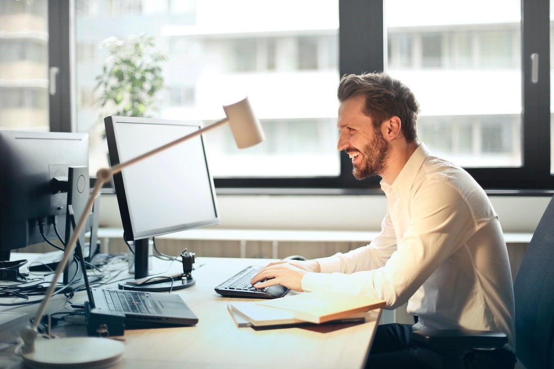 man in office working at desk