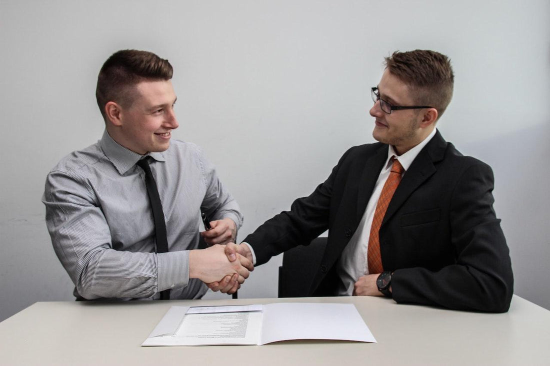 man interviewing and shaking hands