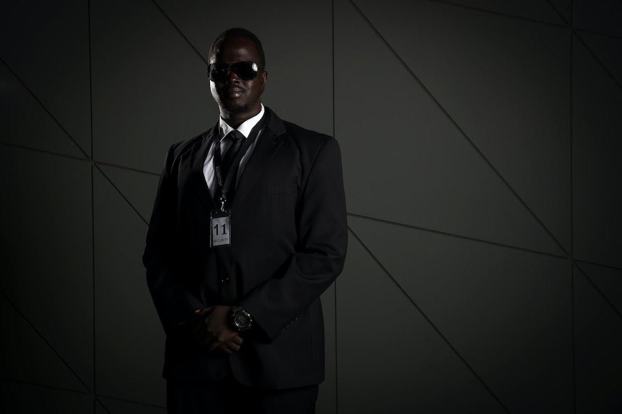 security guard with flashlight